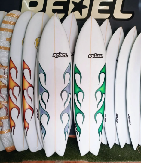 Rack of Rebel boards with flame glass art