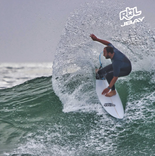 Surfer riding a Rebel