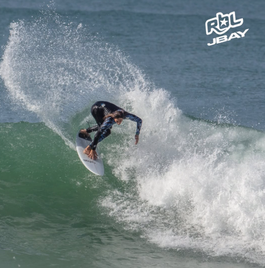 Surfer off the lip